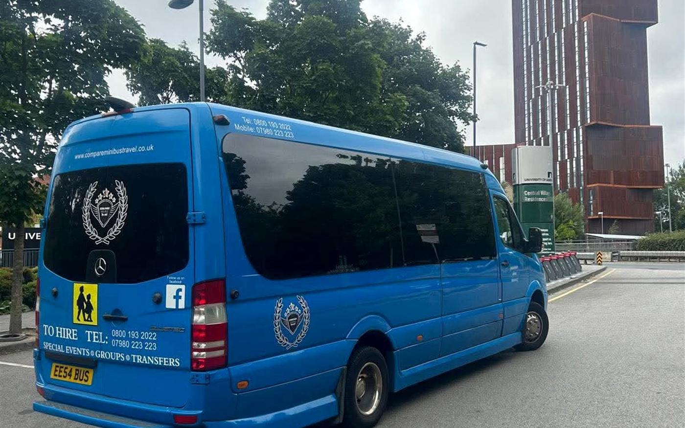 A Compare Minibus Travel minibus on the road