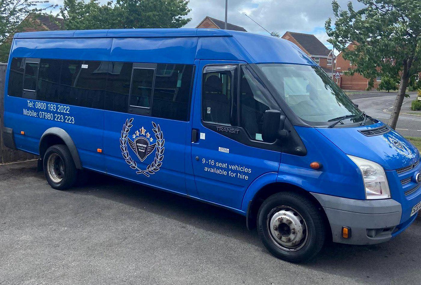A blue Compare Minibus Travel minibus in company livery, front three-quarter view