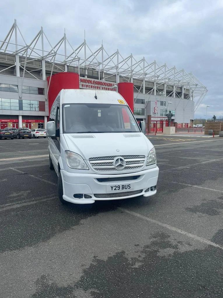 A Compare Minibus Travel minibus parked outside Middlesbrough FC's Riverside Stadium