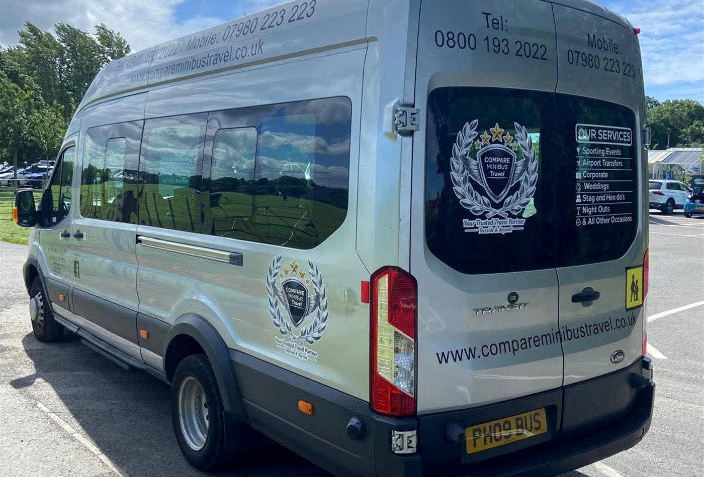 A silver Compare Minibus Travel minibus in company livery